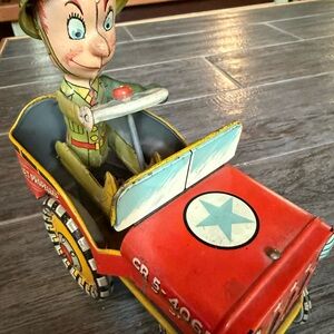 Vintage  GI Joe jeep wind up toy.with Driver - Red and Green